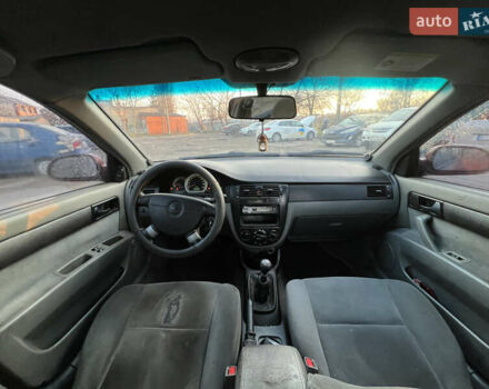 Красный Шевроле Лачетти, объемом двигателя 1.8 л и пробегом 305 тыс. км за 1850 $, фото 14 на Automoto.ua