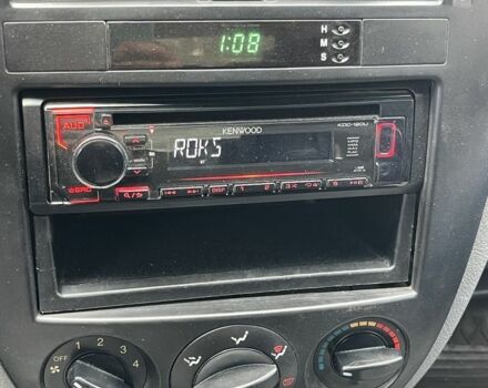 Красный Шевроле Лачетти, объемом двигателя 1.4 л и пробегом 241 тыс. км за 4200 $, фото 5 на Automoto.ua