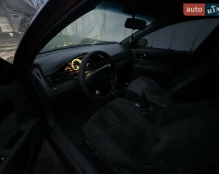 Красный Шевроле Лачетти, объемом двигателя 1.8 л и пробегом 305 тыс. км за 1850 $, фото 8 на Automoto.ua