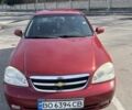 Красный Шевроле Лачетти, объемом двигателя 1.8 л и пробегом 252 тыс. км за 3500 $, фото 1 на Automoto.ua