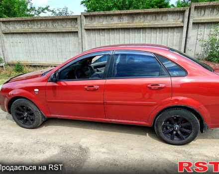 Червоний Шевроле Лачетті, об'ємом двигуна 1.6 л та пробігом 243 тис. км за 3899 $, фото 4 на Automoto.ua