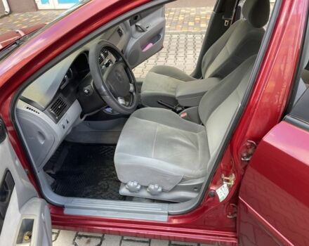 Красный Шевроле Лачетти, объемом двигателя 1.4 л и пробегом 241 тыс. км за 4200 $, фото 1 на Automoto.ua