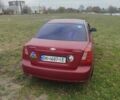 Красный Шевроле Лачетти, объемом двигателя 1.6 л и пробегом 296 тыс. км за 2900 $, фото 2 на Automoto.ua