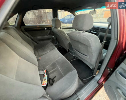 Красный Шевроле Лачетти, объемом двигателя 1.8 л и пробегом 305 тыс. км за 1850 $, фото 12 на Automoto.ua