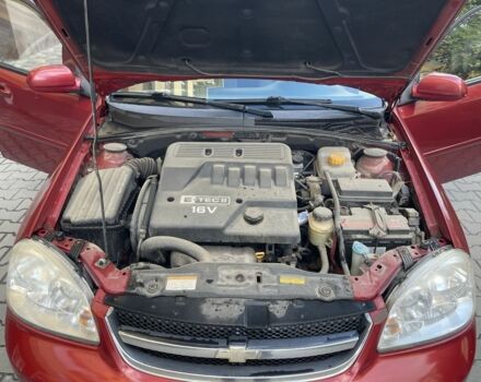 Красный Шевроле Лачетти, объемом двигателя 1.4 л и пробегом 241 тыс. км за 4200 $, фото 6 на Automoto.ua