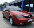 Красный Шевроле Лачетти, объемом двигателя 1.6 л и пробегом 297 тыс. км за 3600 $, фото 1 на Automoto.ua