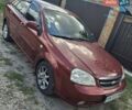 Красный Шевроле Лачетти, объемом двигателя 1.8 л и пробегом 472 тыс. км за 4500 $, фото 2 на Automoto.ua