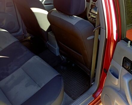 Красный Шевроле Лачетти, объемом двигателя 1.8 л и пробегом 247 тыс. км за 4800 $, фото 1 на Automoto.ua