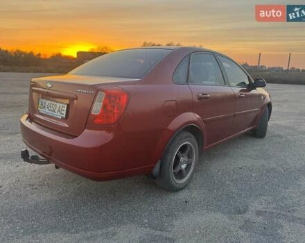 Красный Шевроле Лачетти, объемом двигателя 1.8 л и пробегом 189 тыс. км за 4200 $, фото 3 на Automoto.ua