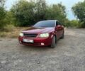 Красный Шевроле Лачетти, объемом двигателя 1.8 л и пробегом 211 тыс. км за 5200 $, фото 4 на Automoto.ua