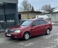 Красный Шевроле Лачетти, объемом двигателя 1.6 л и пробегом 250 тыс. км за 2700 $, фото 1 на Automoto.ua