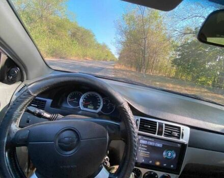 Красный Шевроле Лачетти, объемом двигателя 1.8 л и пробегом 211 тыс. км за 5200 $, фото 8 на Automoto.ua