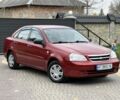 Красный Шевроле Лачетти, объемом двигателя 1.6 л и пробегом 127 тыс. км за 2900 $, фото 1 на Automoto.ua