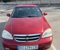 Красный Шевроле Лачетти, объемом двигателя 1.8 л и пробегом 252 тыс. км за 3500 $, фото 1 на Automoto.ua