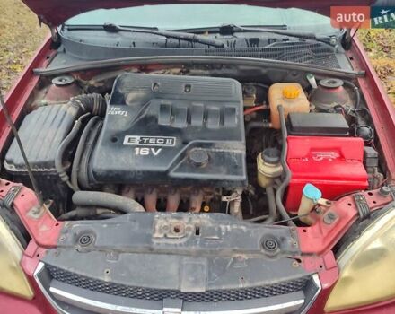 Красный Шевроле Лачетти, объемом двигателя 1.6 л и пробегом 296 тыс. км за 2900 $, фото 4 на Automoto.ua