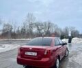 Красный Шевроле Лачетти, объемом двигателя 1.6 л и пробегом 362 тыс. км за 2600 $, фото 1 на Automoto.ua
