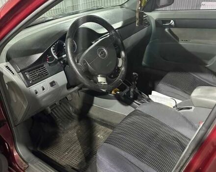 Червоний Шевроле Лачетті, об'ємом двигуна 1.8 л та пробігом 342 тис. км за 2400 $, фото 9 на Automoto.ua
