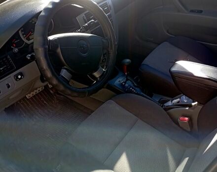 Красный Шевроле Лачетти, объемом двигателя 1.8 л и пробегом 247 тыс. км за 4800 $, фото 2 на Automoto.ua