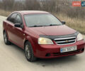 Красный Шевроле Лачетти, объемом двигателя 1.6 л и пробегом 223 тыс. км за 3700 $, фото 9 на Automoto.ua