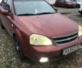 Красный Шевроле Лачетти, объемом двигателя 1.8 л и пробегом 400 тыс. км за 1100 $, фото 1 на Automoto.ua