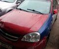 Красный Шевроле Лачетти, объемом двигателя 1.8 л и пробегом 190 тыс. км за 2000 $, фото 1 на Automoto.ua