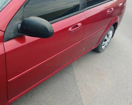 Красный Шевроле Лачетти, объемом двигателя 1.6 л и пробегом 143 тыс. км за 3800 $, фото 7 на Automoto.ua