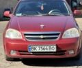 Червоний Шевроле Лачетті, об'ємом двигуна 1.8 л та пробігом 151 тис. км за 4467 $, фото 1 на Automoto.ua