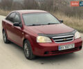 Красный Шевроле Лачетти, объемом двигателя 1.6 л и пробегом 223 тыс. км за 3700 $, фото 10 на Automoto.ua