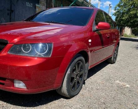 Красный Шевроле Лачетти, объемом двигателя 1.8 л и пробегом 211 тыс. км за 5200 $, фото 5 на Automoto.ua