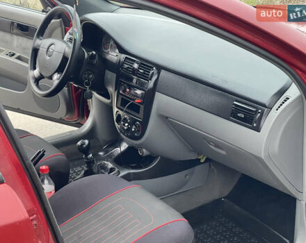 Красный Шевроле Лачетти, объемом двигателя 1.6 л и пробегом 223 тыс. км за 3700 $, фото 25 на Automoto.ua