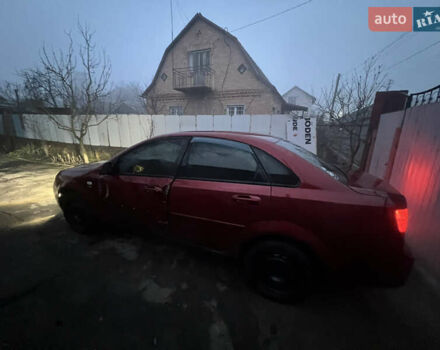Красный Шевроле Лачетти, объемом двигателя 1.8 л и пробегом 305 тыс. км за 1850 $, фото 7 на Automoto.ua