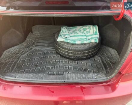 Красный Шевроле Лачетти, объемом двигателя 1.8 л и пробегом 189 тыс. км за 4200 $, фото 14 на Automoto.ua