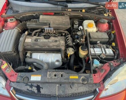Красный Шевроле Лачетти, объемом двигателя 1.8 л и пробегом 189 тыс. км за 4200 $, фото 12 на Automoto.ua