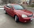 Красный Шевроле Лачетти, объемом двигателя 1.6 л и пробегом 300 тыс. км за 3100 $, фото 1 на Automoto.ua