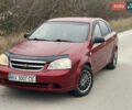 Красный Шевроле Лачетти, объемом двигателя 1.6 л и пробегом 223 тыс. км за 3700 $, фото 2 на Automoto.ua