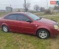 Красный Шевроле Лачетти, объемом двигателя 1.6 л и пробегом 296 тыс. км за 2900 $, фото 1 на Automoto.ua