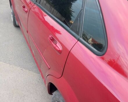 Красный Шевроле Лачетти, объемом двигателя 1.6 л и пробегом 143 тыс. км за 3800 $, фото 3 на Automoto.ua