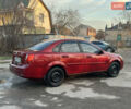 Красный Шевроле Лачетти, объемом двигателя 1.8 л и пробегом 305 тыс. км за 1800 $, фото 2 на Automoto.ua