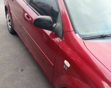 Красный Шевроле Лачетти, объемом двигателя 1.6 л и пробегом 143 тыс. км за 3800 $, фото 8 на Automoto.ua