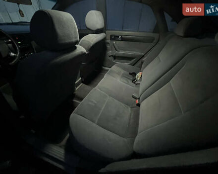 Красный Шевроле Лачетти, объемом двигателя 1.8 л и пробегом 305 тыс. км за 1850 $, фото 10 на Automoto.ua