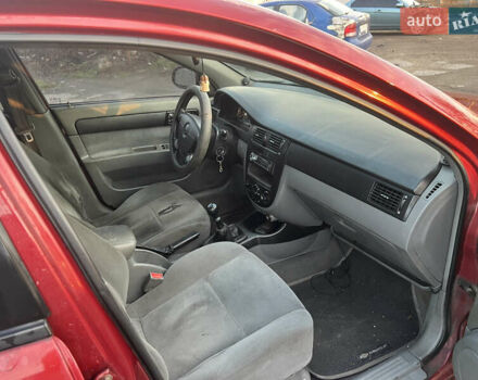 Красный Шевроле Лачетти, объемом двигателя 1.8 л и пробегом 305 тыс. км за 1850 $, фото 10 на Automoto.ua