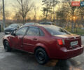 Красный Шевроле Лачетти, объемом двигателя 1.8 л и пробегом 305 тыс. км за 1850 $, фото 5 на Automoto.ua