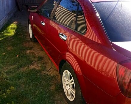 Красный Шевроле Лачетти, объемом двигателя 1.8 л и пробегом 247 тыс. км за 4800 $, фото 3 на Automoto.ua