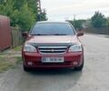 Червоний Шевроле Лачетті, об'ємом двигуна 1.8 л та пробігом 207 тис. км за 6020 $, фото 1 на Automoto.ua