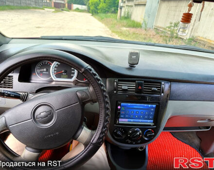 Червоний Шевроле Лачетті, об'ємом двигуна 1.6 л та пробігом 243 тис. км за 3899 $, фото 3 на Automoto.ua