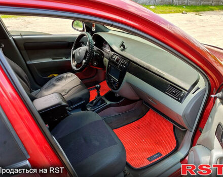 Червоний Шевроле Лачетті, об'ємом двигуна 1.6 л та пробігом 243 тис. км за 3899 $, фото 1 на Automoto.ua