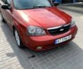 Красный Шевроле Лачетти, объемом двигателя 1.6 л и пробегом 297 тыс. км за 3600 $, фото 7 на Automoto.ua