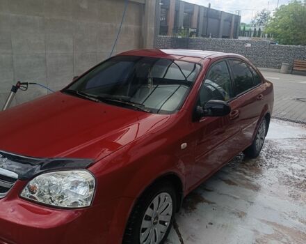 Червоний Шевроле Лачетті, об'ємом двигуна 1.6 л та пробігом 265 тис. км за 3099 $, фото 3 на Automoto.ua