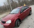 Красный Шевроле Лачетти, объемом двигателя 1.6 л и пробегом 200 тыс. км за 4700 $, фото 1 на Automoto.ua