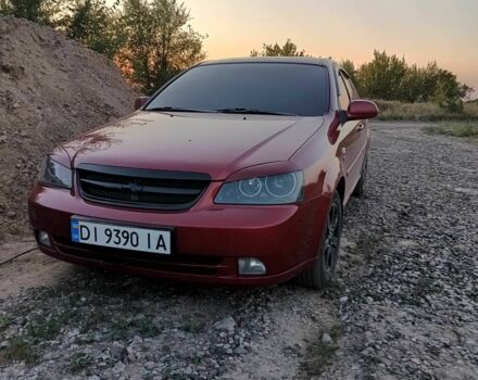 Красный Шевроле Лачетти, объемом двигателя 1.8 л и пробегом 211 тыс. км за 5200 $, фото 9 на Automoto.ua